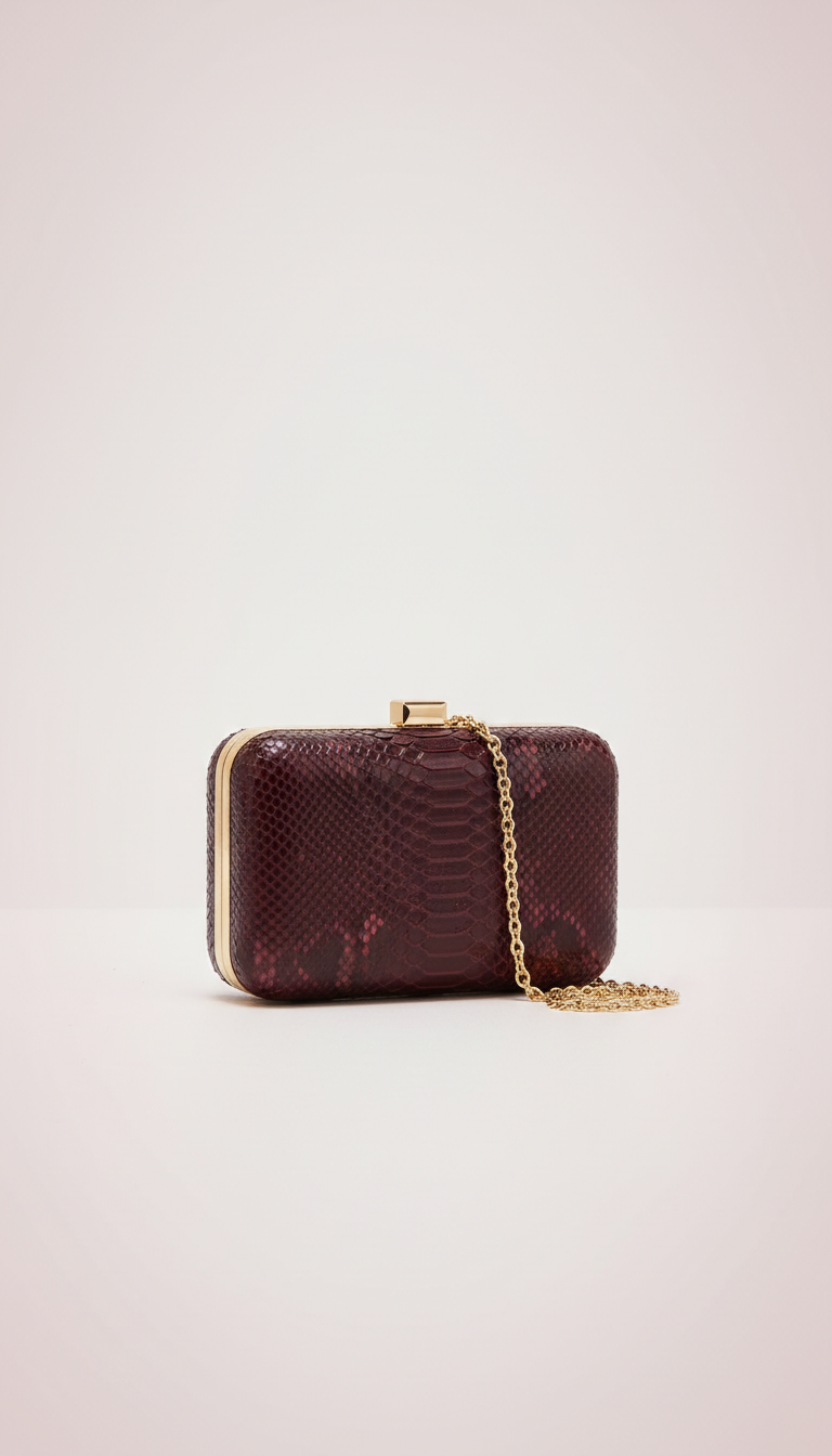 Mini-Clutch aus Bordeaux-Python in Boxform